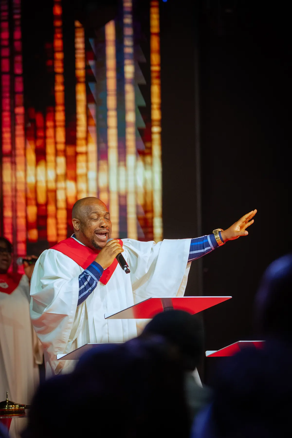 A pastor preaching during Sunday service
