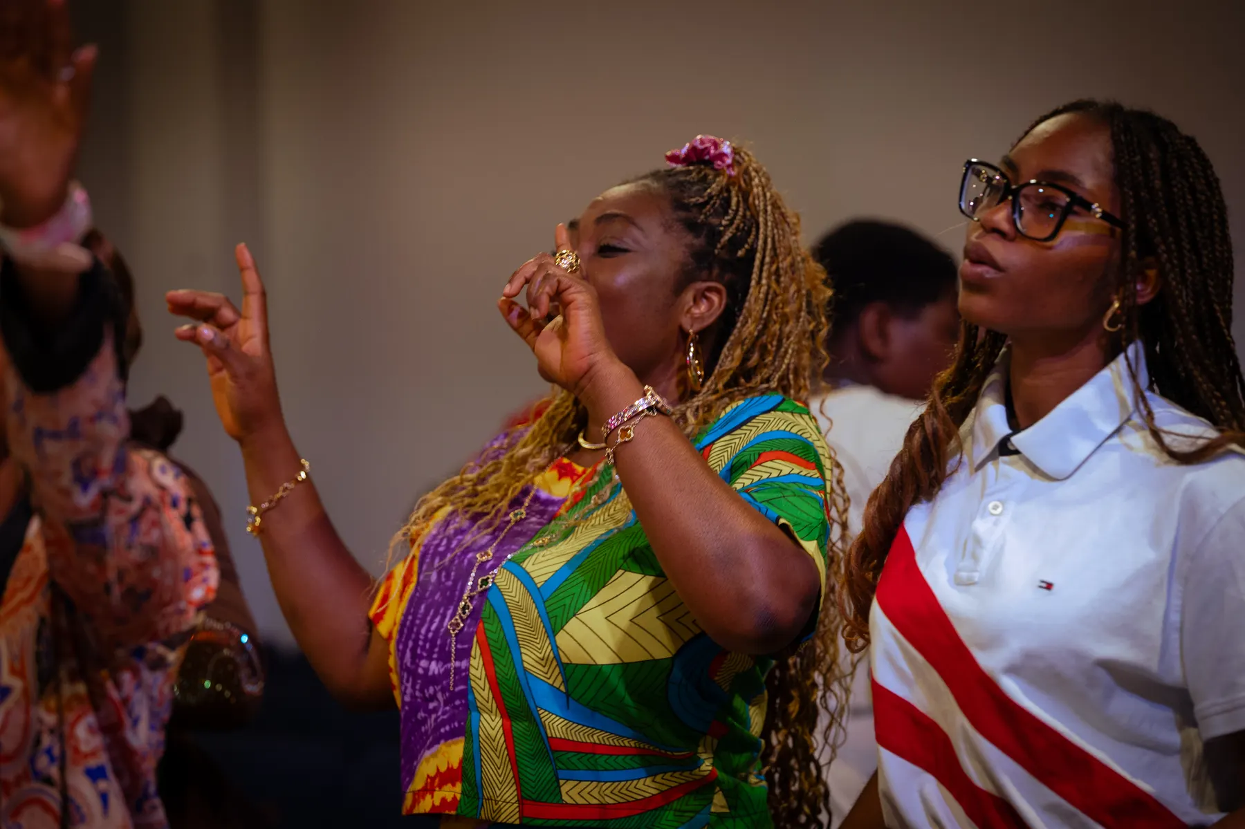 Two women worshipping together